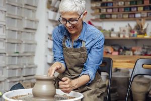 senior-making-pottery-as-one-of-the-services-provided-in-independent-living