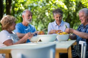 a-group-enjoying-healthy-foods-for-seniors