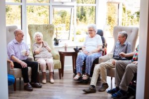 seniors socialize in a senior living facility