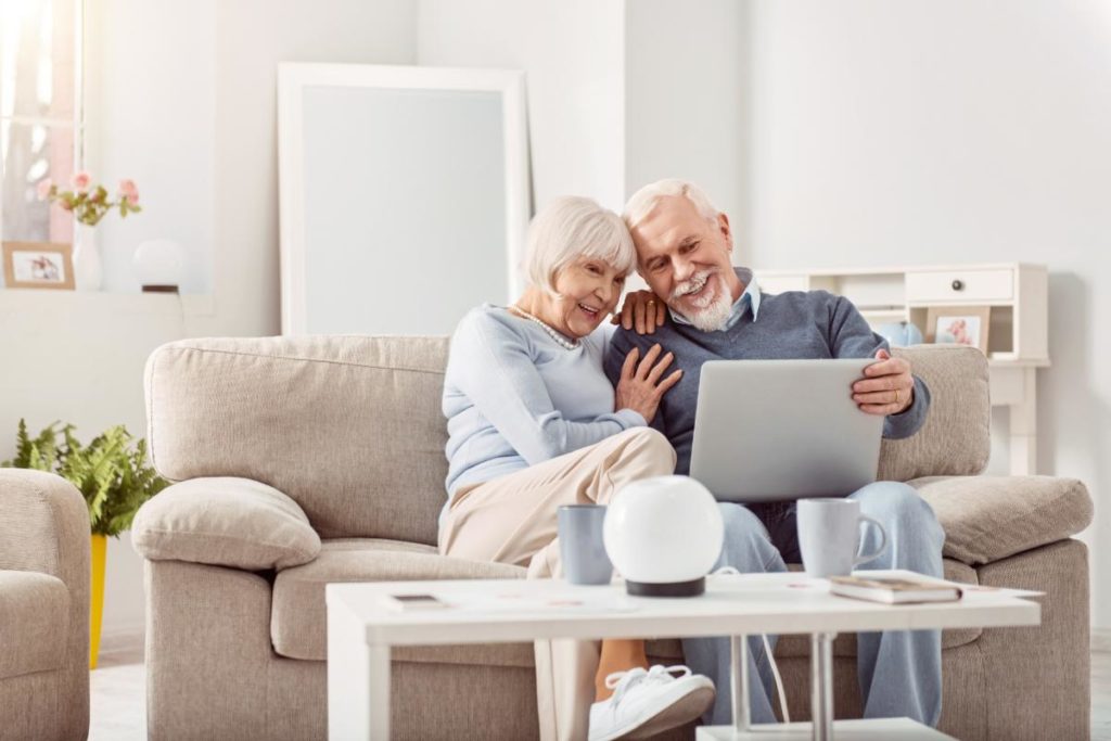 a senior couple discusses their options for senior living and a retirement home