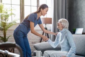 Nurse consoles senior as she explains the benefits of assisted living