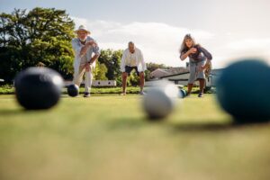 Seniors play sports game while enjoying independent living activities for seniors